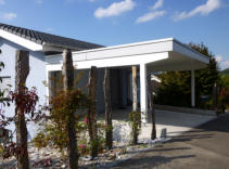 Carport in Bubendorf mit Vollholzdecke - NM Holzbau GmbH Titterten Baselland